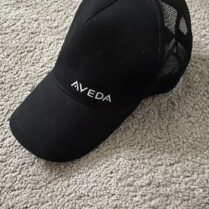 Aveda trucker hat
